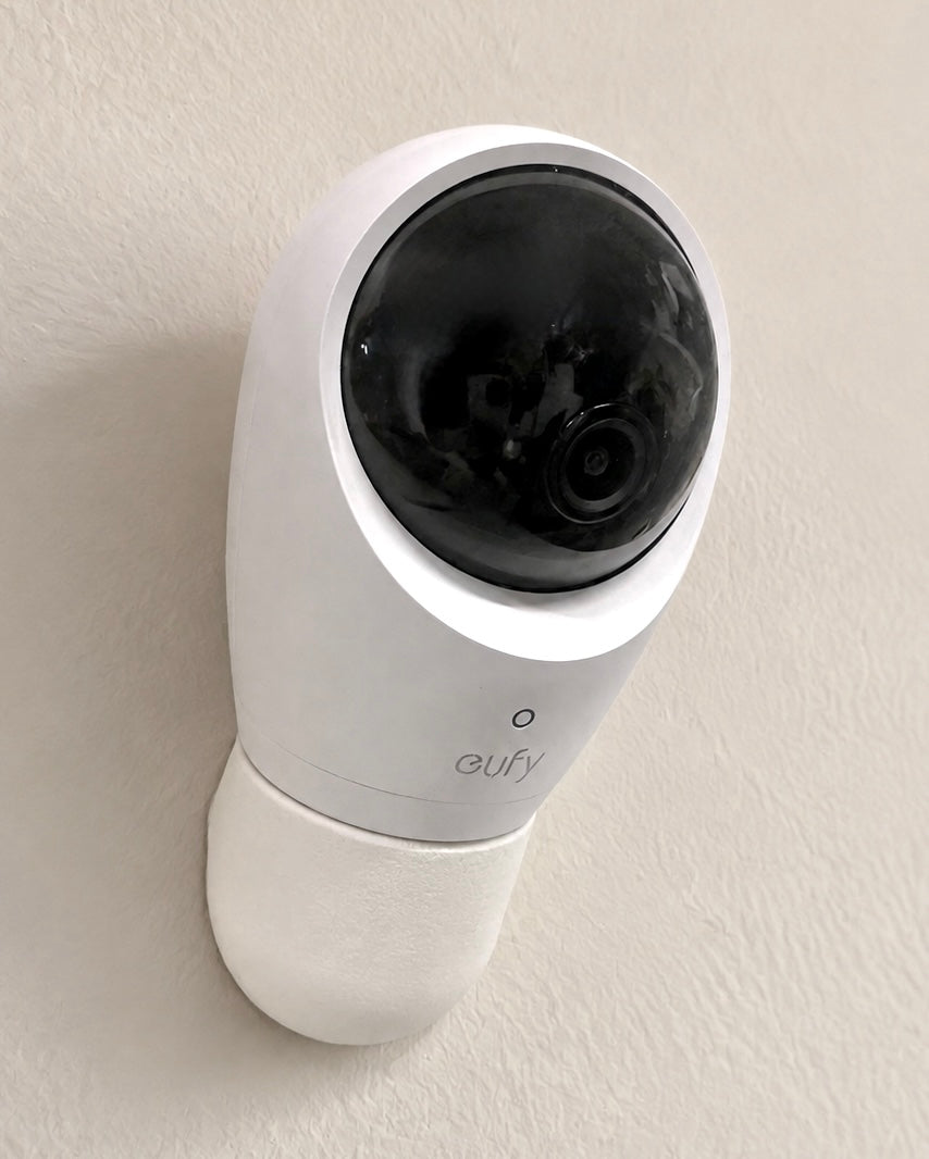 Eufy baby monitor camera mounted on a wall using a wall mount
