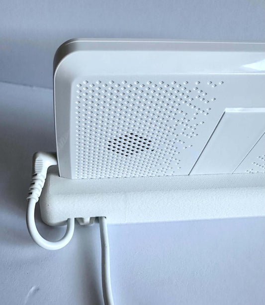 Infant Optics Monitor Screen Dock | Cord Holder | DXR-8 & DXR-8 Pro showing the monitor securely mounted with tidy cord management.