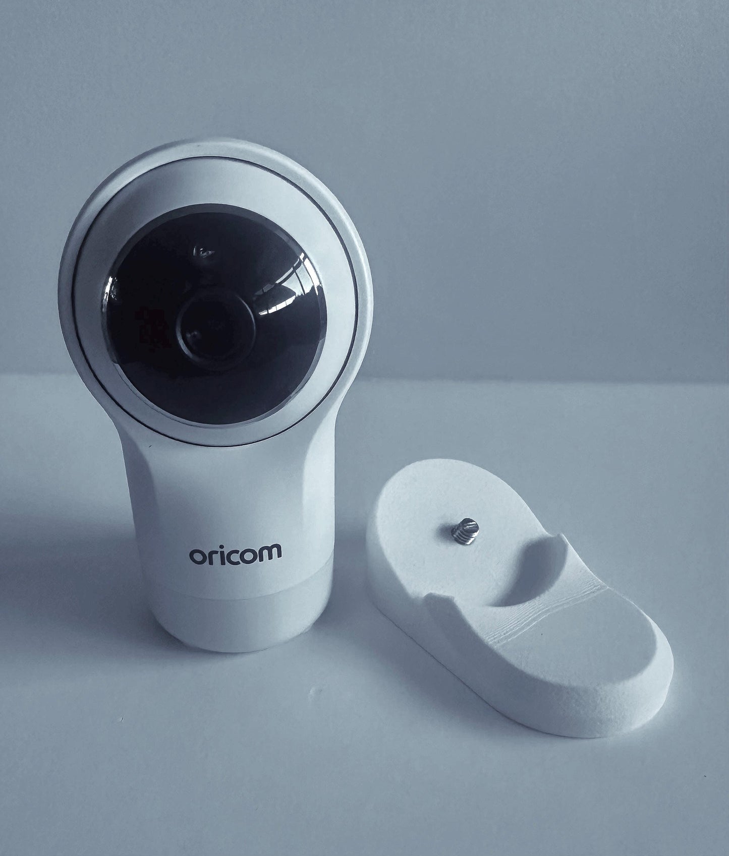 Oricom Baby Monitor Shelf Mount | Angled | OBH930 with camera base adapter for no-drill installation.