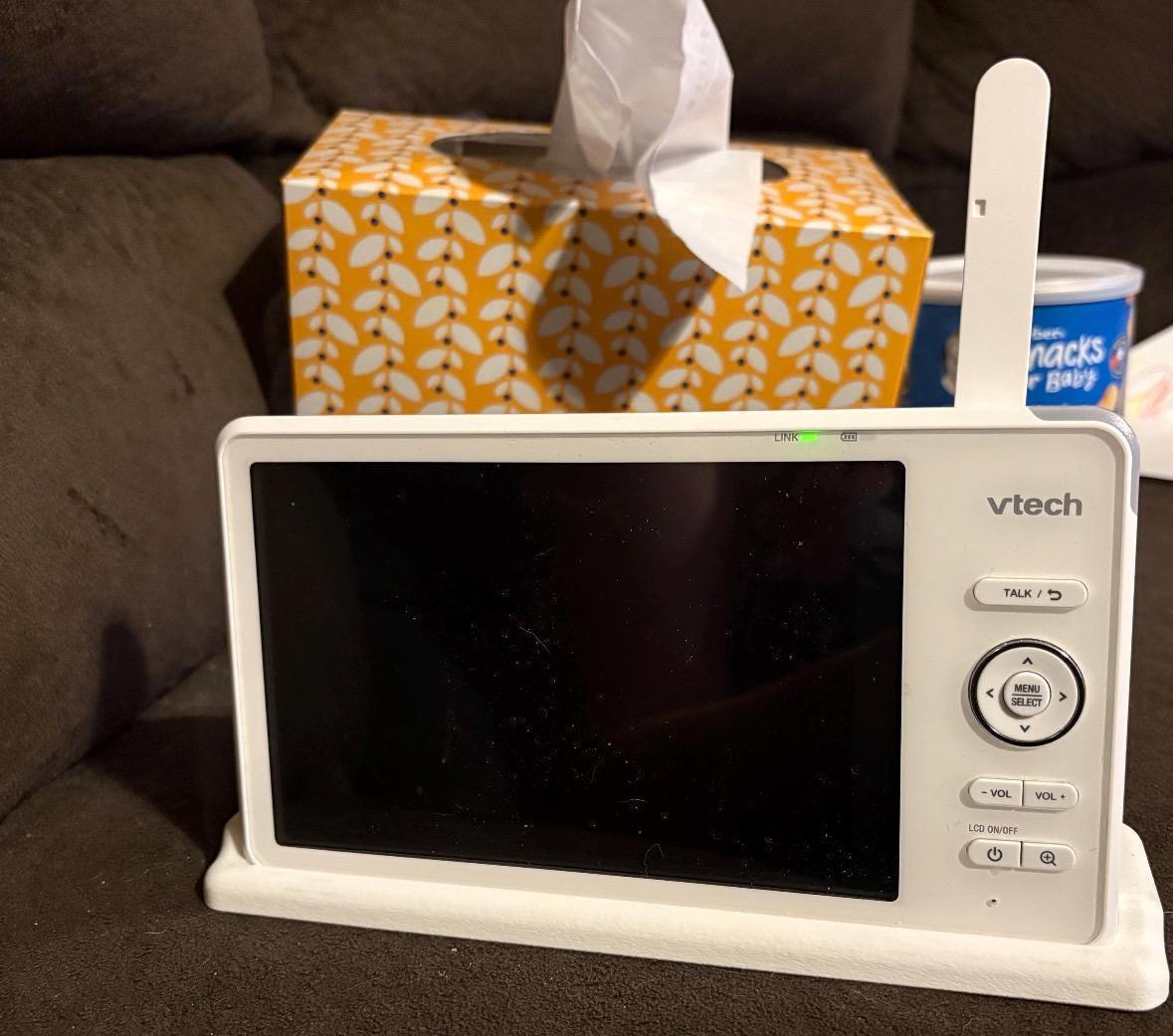VTech RM7766HD and RM7756HD parent unit screen dock in a home setting