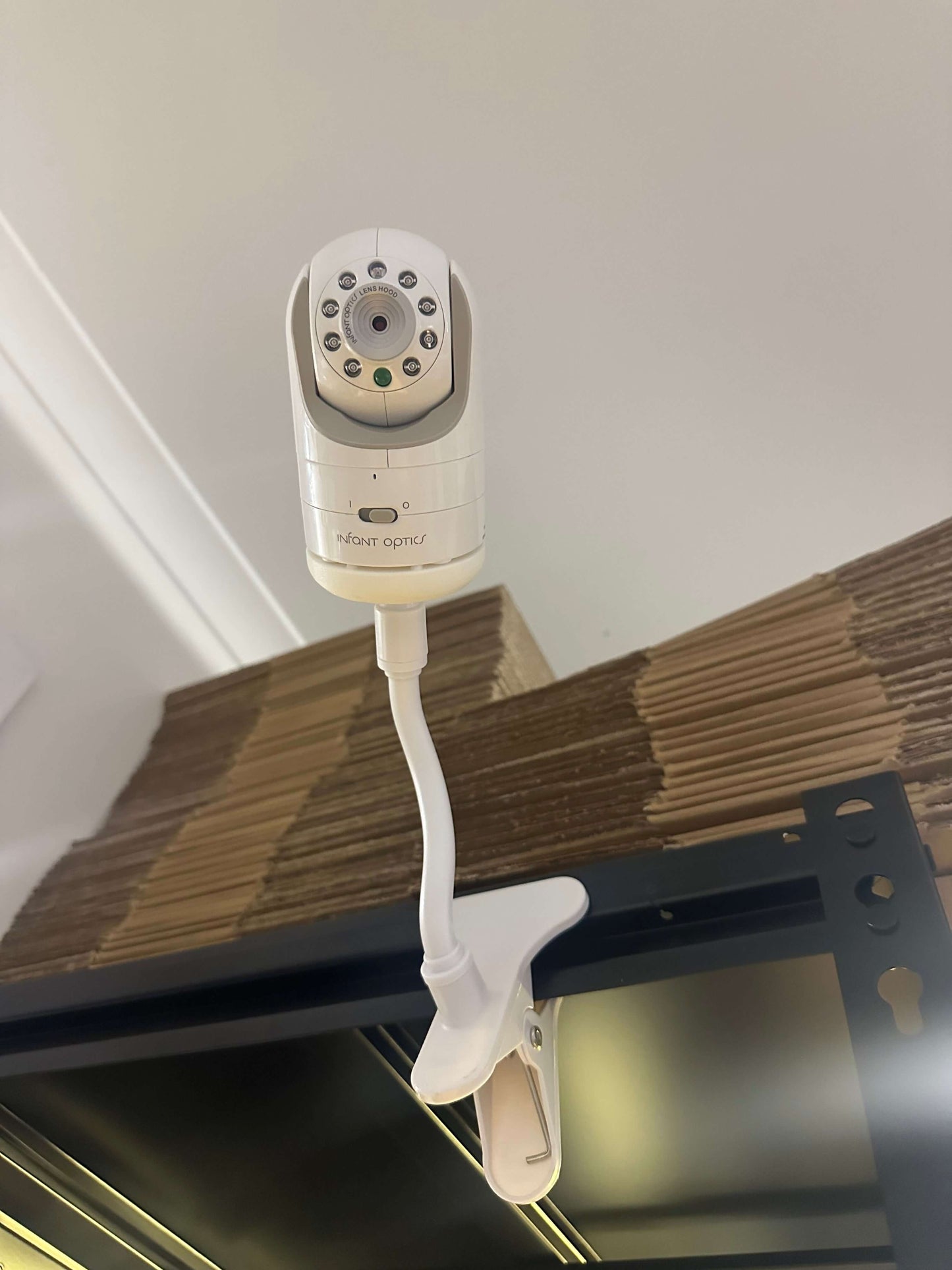 Infant Optics Baby Monitor Mount Adapter (1/4” Thread) | DXR-8 & DXR-8 Pro attached to a shelf mount.