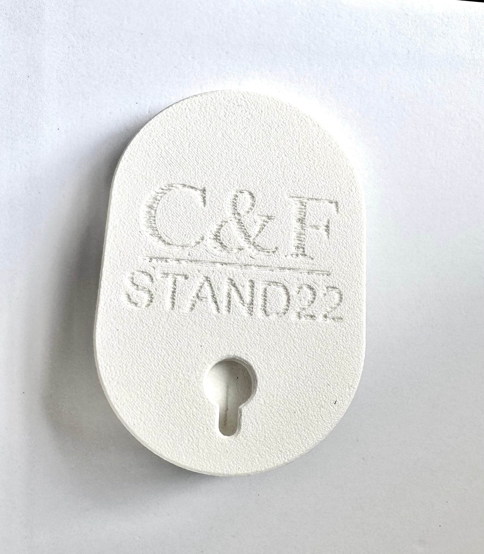C&F STAND22 white wall mount adapter with keyhole design for secure installation