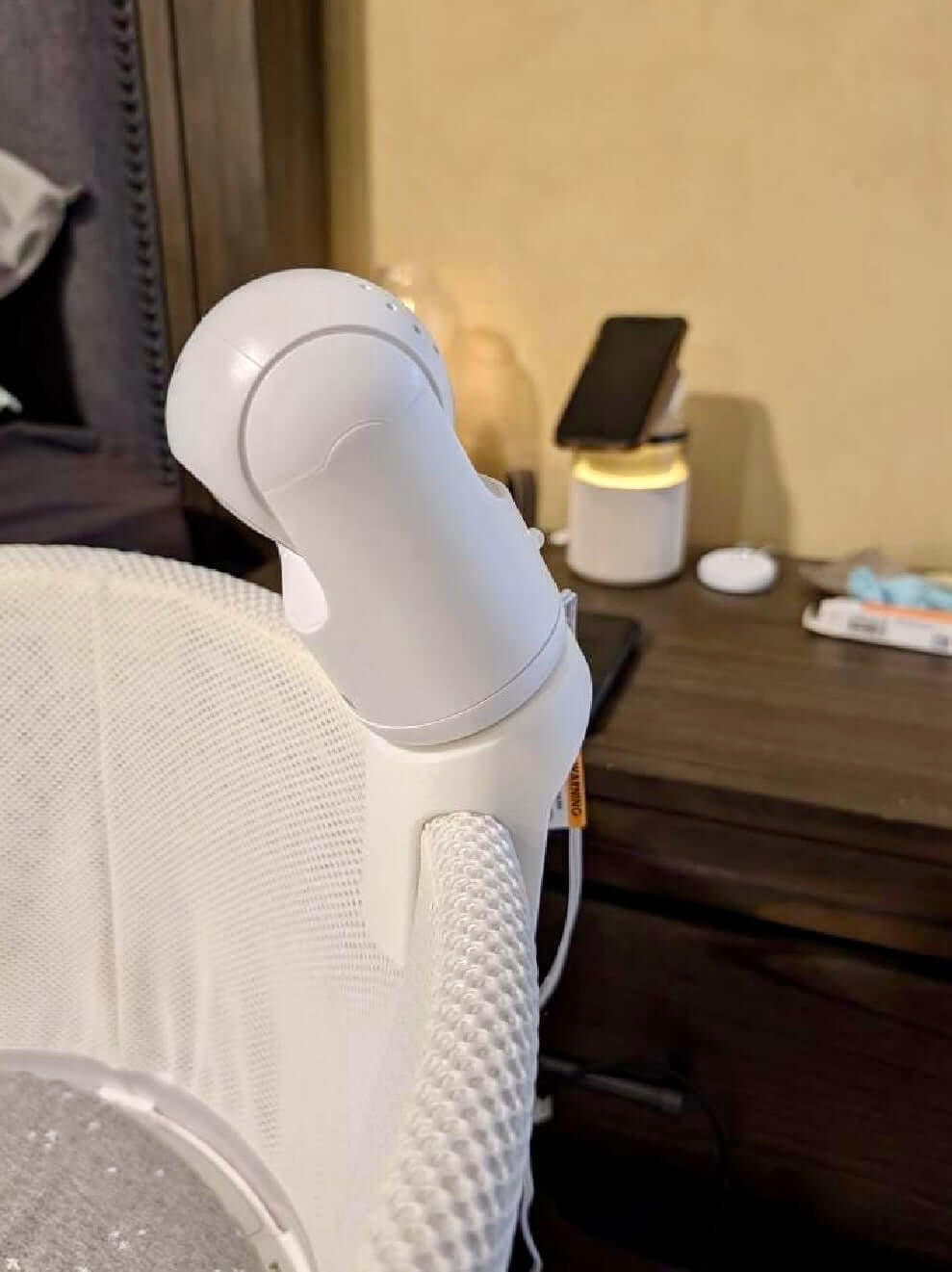 Vtech Baby Monitor Snoo & Cot Mount | BM5850HD securely attached to a Snoo bassinet for clear overhead viewing.
