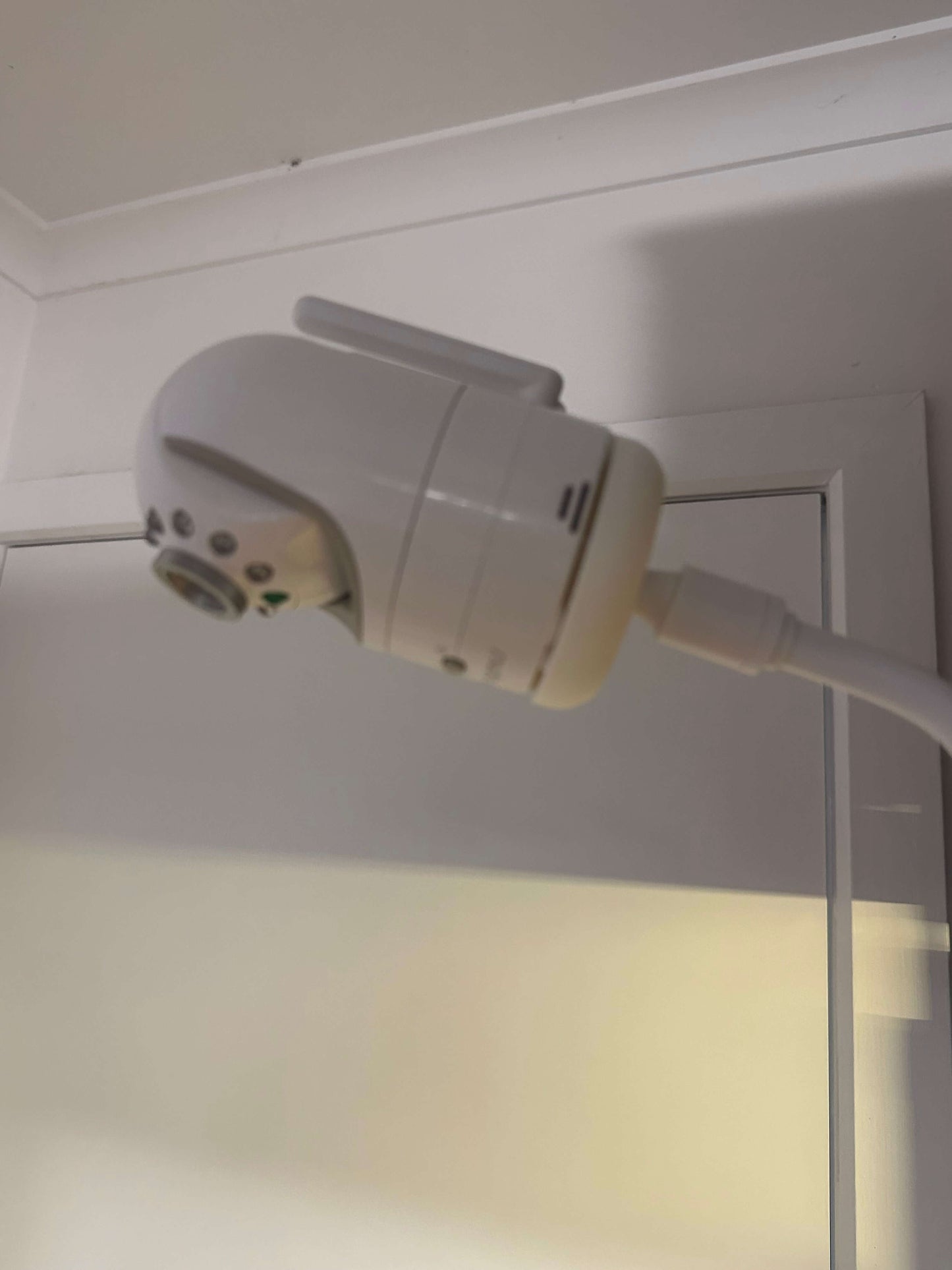 Infant Optics Baby Monitor Mount Adapter (1/4” Thread) | DXR-8 & DXR-8 Pro mounted on a flexible gooseneck.