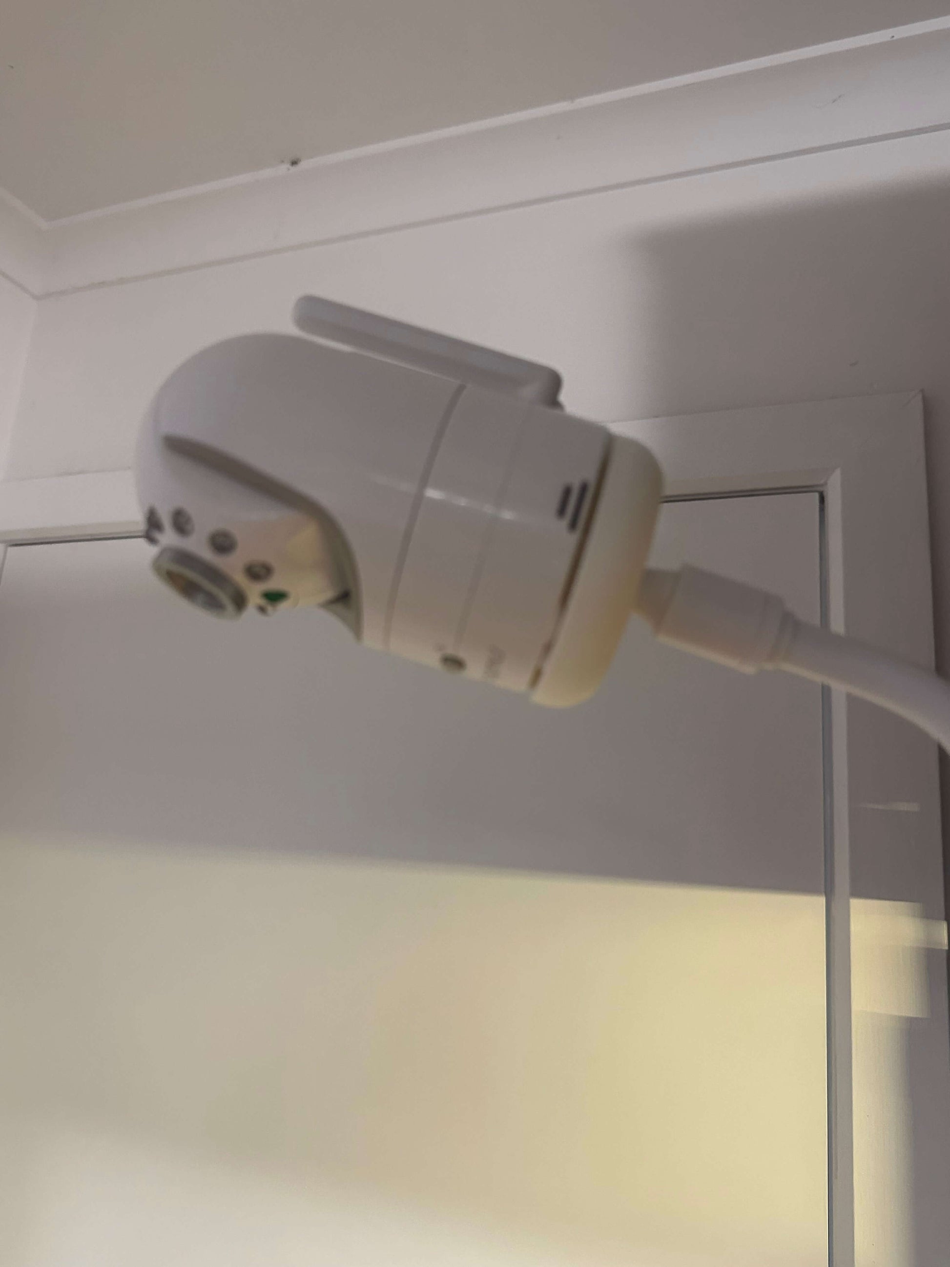 Infant Optics Baby Monitor Mount Adapter (1/4” Thread) | DXR-8 & DXR-8 Pro mounted on a flexible gooseneck.