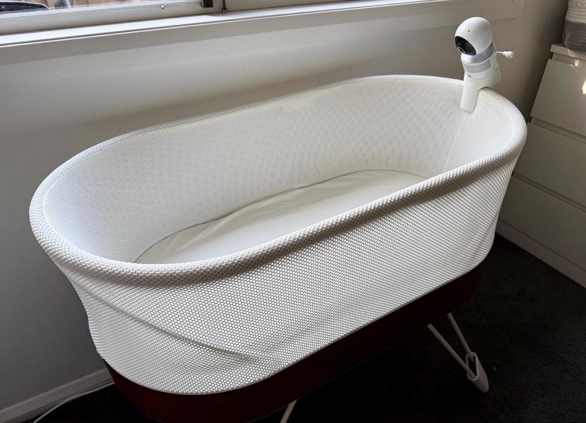 VTech Baby Monitor Snoo & Cot Mount | RM7754HD + More attached to a white Snoo bassinet for clear overhead video.