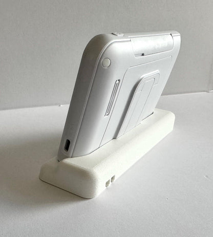 Oricom Baby Monitor Screen Dock | Cord Holder | SC875 displayed upright on a stable stand with built-in cord holder.