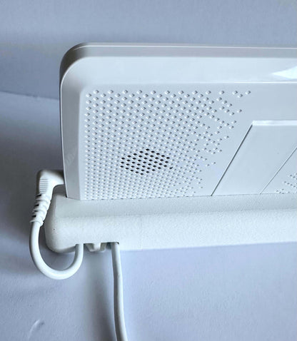 Infant Optics Monitor Screen Dock | Cord Holder | DXR-8 & DXR-8 Pro showing the monitor securely mounted with tidy cord management.