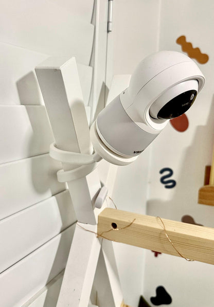 Universal Flexible Gooseneck Baby Monitor Mounting Arm (Standard 1/4 Inch Thread) supporting a white baby monitor camera