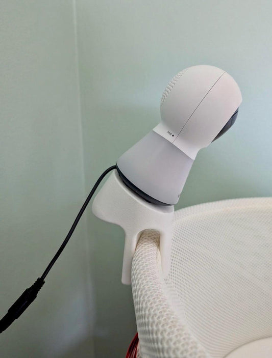 Vtech Baby Monitor Snoo & Cot Mount | Fits BM3350N + More attached to a bassinet with a clear overhead view.