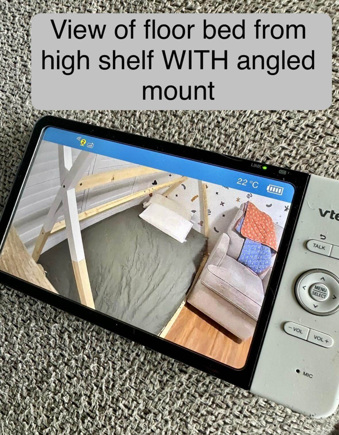 Owlet Baby Monitor Shelf Mount | Angled | Cam 2 displaying high shelf view of cot bed for secure monitoring.