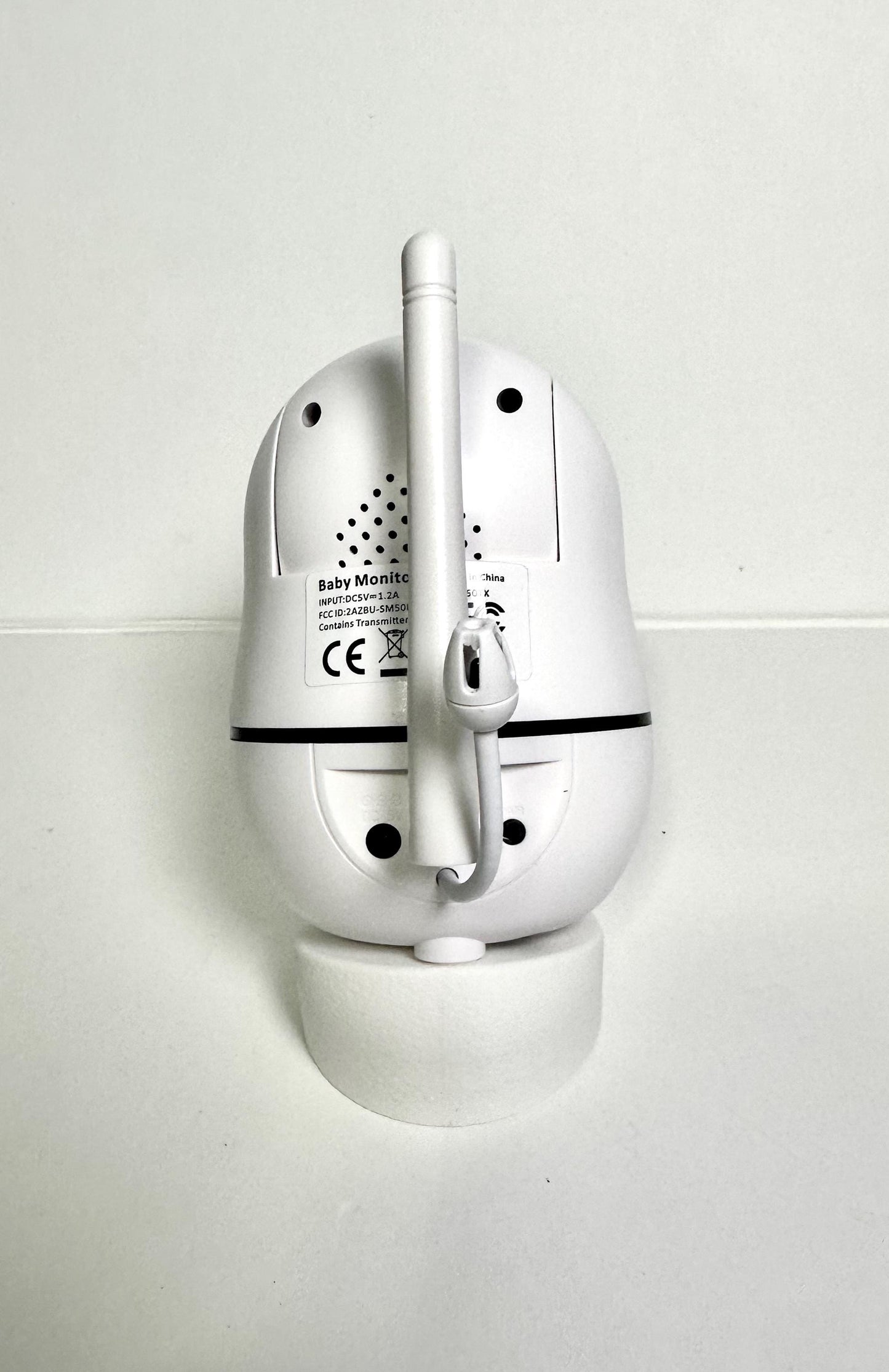 Tweetycam Baby Monitor Shelf Mount | Angled | All Models - Back view of baby monitor on shelf mount.