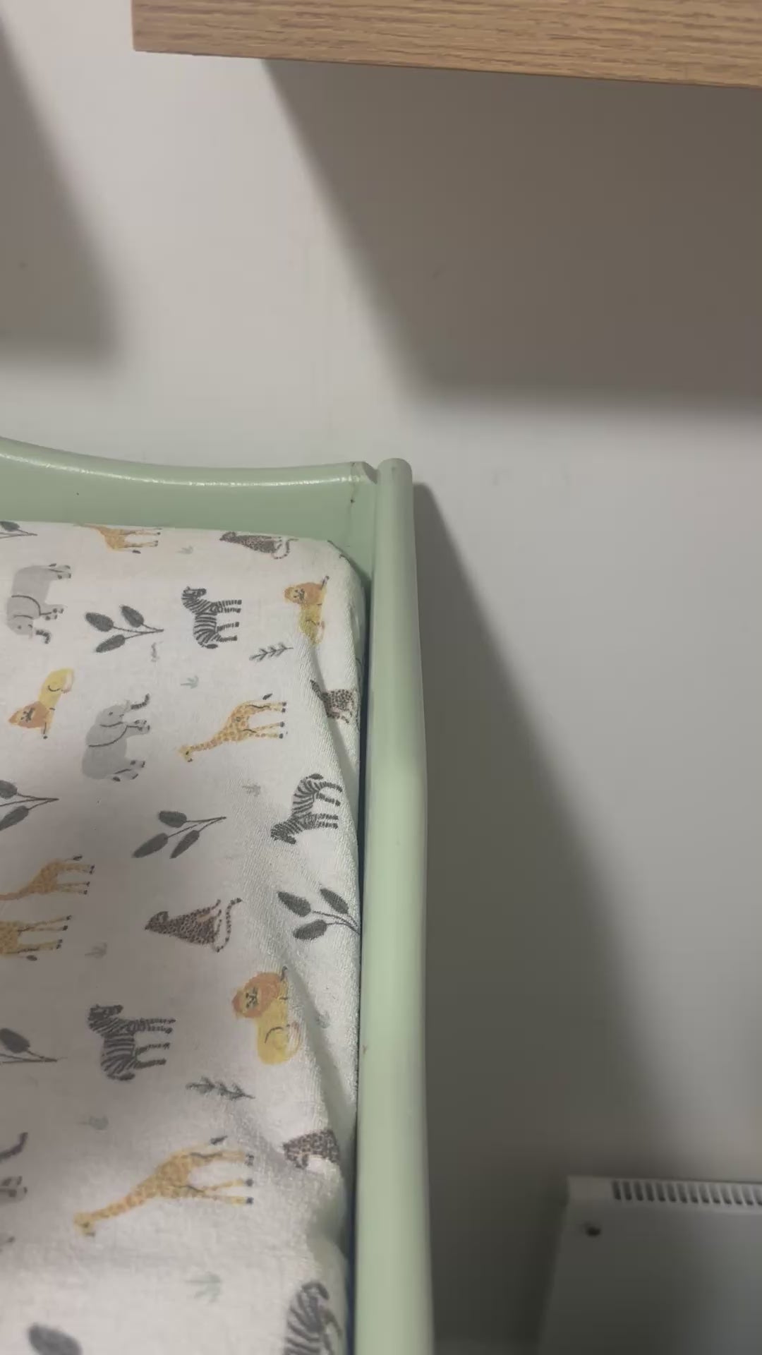 VTech Baby Monitor Snoo & Cot Mount | BM4700N + More installed on a bassinet with animal print sheet.