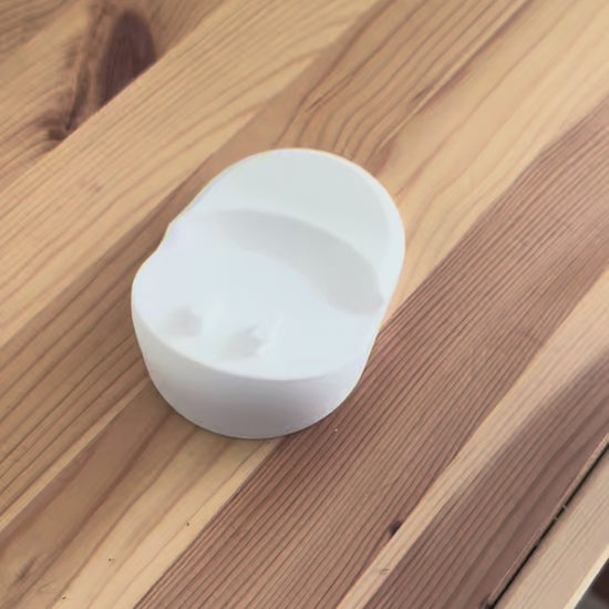 VTech Baby Monitor Shelf Mount | Angled | RM7754HD & More on a wooden table.