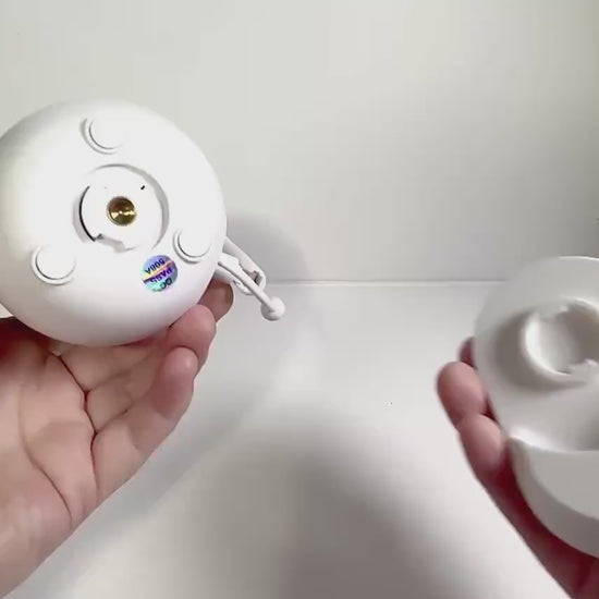 Tweetycam Baby Monitor Shelf Mount | Angled | All Models shown in hands for easy installation.