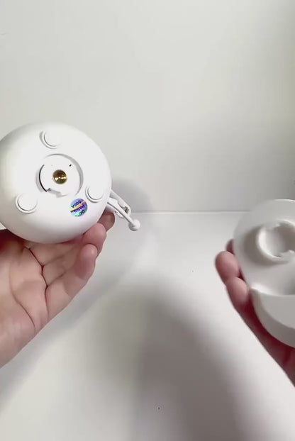 Tweetycam Baby Monitor Shelf Mount | Angled | All Models shown in hands for easy installation.